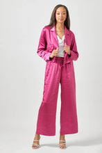 Load image into Gallery viewer, Woman wearing a pink satin outfit on a white background