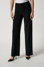 Load image into Gallery viewer, Wide-leg pants with a high waistline and 32-inch inseam create a lengthening effect, offering comfort and style with a tucked-in blouse.