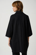 Load image into Gallery viewer, A sleek black cocoon coat