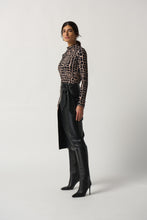 Load image into Gallery viewer, Trendy animal print top made from jersey fabric with long sleeves, mock neck, and a fitted silhouette. Style it up with heels or down with sneakers and jeans.