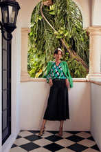 Load image into Gallery viewer, Step out in style with these sleek wide-leg culotte pants. Made from silky knit fabric, they feature a flared cut, wide waistband, and a chic gold accent.