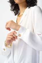 Load image into Gallery viewer, Exquisite satin top featuring notch collar, lapels, and centre-front ties. Puff sleeves with gold button cuffs. Sleek yokes for structure.