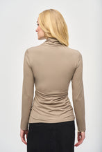 Load image into Gallery viewer, Beautiful jersey knit top with a wrap neckline and long sleeves, designed with side shirring for a flattering day-to-night style.