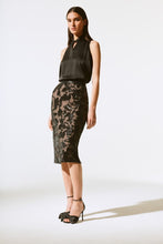 Load image into Gallery viewer, Timeless pull-on skirt featuring floral design, sequins, satin waistband, sleek pencil shape, and a striking back slit.