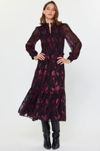 Load image into Gallery viewer, Smocked midi dress with flattering silhouette and sheer long sleeves. Black with red floral design.