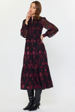 Load image into Gallery viewer, Smocked midi dress with flattering silhouette and sheer long sleeves. Black with red floral design.