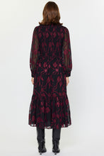 Load image into Gallery viewer, Smocked midi dress with flattering silhouette and sheer long sleeves. Black with red floral design.