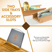 Load image into Gallery viewer, Eco-friendly bamboo caddy tray with extendable sides, mobile device tray & wine holder for a relaxing bath experience.