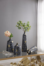 Load image into Gallery viewer, Blue glass vase with gold flashes, wide curved silhouette, short neck, round opening. Perfect for console table, mantel, or shelving unit.