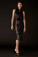 Load image into Gallery viewer, Elegant pull-on skirt with floral print, sequined fabric, satin waistband, pencil silhouette, and a dramatic back slit.
