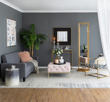 Load image into Gallery viewer, Sleek gold finish full length mirror swivels 360 degrees. Features three storage shelves for jewelry, cosmetics, and small items.