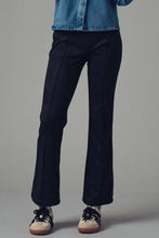 Load image into Gallery viewer, Black faux suede flare mid rise pants.