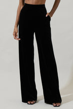 Load image into Gallery viewer, Black high waisted velvet wide leg pants.