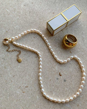 Load image into Gallery viewer, Classy pearl necklace with genuine freshwater pearls, adjustable length, and versatile styling options. Timeless elegance for any occasion.