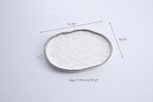 Load image into Gallery viewer, Round serving platter in Salerno: gleaming white porcelain with silver beads. Perfect for sweet treats, hors d'oeuvres, sandwiches, or pastries. Food, dishwasher, and oven safe. Easy to care for.