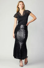 Load image into Gallery viewer, A dazzling black sequin skirt that shimmers and shines with every step.