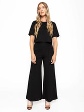 Load image into Gallery viewer, Black cropped top and wide leg pants made from Ponte knit fabric. Slimming and elongating, perfect for petite ladies and flat or heel lovers.