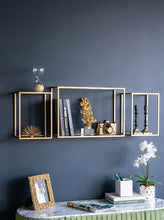 Load image into Gallery viewer, Enhance your home or office with this set of 6 floating wall shelves featuring a gold frame, varied designs, iron, and veneer accents.