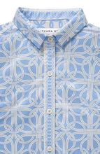 Load image into Gallery viewer, Tailored women's shirt in light blue and white with a geometric pattern, V-neckline, and contrasting cuffs, ideal for casual or upscale wear.