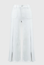 Load image into Gallery viewer, Elevate your style with these culotte jeans featuring four pockets, an embellished seam, and a trendy frayed hem.