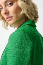 Load image into Gallery viewer, Elevate your wardrobe with this bouclé blazer, featuring a notched collar, long sleeves, and a sleek, tailored silhouette.