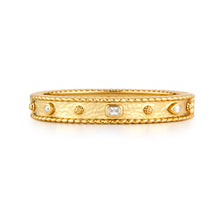 Load image into Gallery viewer, A gold band adorned with diamonds on the side, featuring the Berry Gem Hinged Bangle with clear cubic zirconia accents.