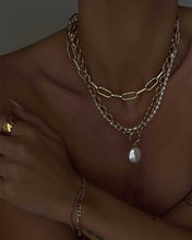 Load image into Gallery viewer, Elegant and versatile, this pearl necklace showcases genuine freshwater pearls on a chain. Wear it as a choker or necklace, with adjustable length.