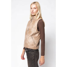 Load image into Gallery viewer, Woman wearing a beige vest over a brown shirt on a white background