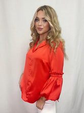Load image into Gallery viewer, Luxurious Tangerine Puff Sleeve top in vibrant color made from Posh Couture fabric. Elegant and fashion-forward for special occasions.