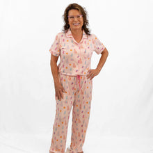 Load image into Gallery viewer, Fun and whimsical Twinkle Tree family pajamas with soft fabric and pink accents.
