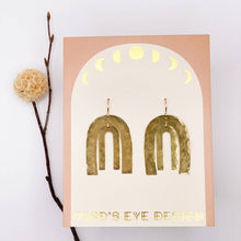 Load image into Gallery viewer, Hammered raw brass and gold plated Arco Iris Earrings on card, lead and nickel free.
