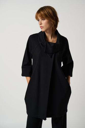 Black Classic Cocoon Coat: A timeless and elegant outerwear piece that exudes sophistication and style.