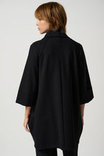 Load image into Gallery viewer, A sleek black cocoon coat
