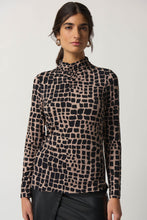 Load image into Gallery viewer, Animal print jersey top with long sleeves, fitted silhouette, and mock neck. Perfect for dressing up with trousers and heels or keeping casual with jeans and sneakers.
