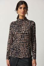 Load image into Gallery viewer, Animal print jersey top with long sleeves, fitted silhouette, and mock neck. Perfect for dressing up with trousers and heels or keeping casual with jeans and sneakers.
