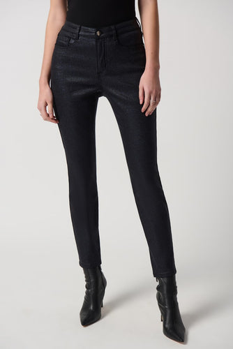 Black skinny jeans made from a sleek fabric. Perfect for a stylish and slimming look.