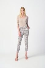 Load image into Gallery viewer, High-quality millennium fabric pull-on pants, featuring captivating abstract print for a flattering slim silhouette. Comes with stylish side pockets and a polished faux fly, enhancing its composed appearance.
