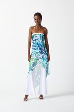 Load image into Gallery viewer, Silky knit strapless jumpsuit with a flared leg and sheer high-low overlay exuding grace and feminine chic. Vibrant tropical print adds irresistible appeal.
