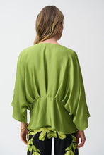 Load image into Gallery viewer, A luxurious hammered satin top featuring three-quarter kimono sleeves, a V-neckline, and elegant peplum silhouette.

