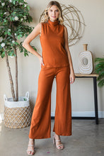 Load image into Gallery viewer, Velour long flowy pants in rich color, adding glamour and fun to any outfit. Luxuriously soft feel for effortless style.
