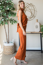 Load image into Gallery viewer, Velour long flowy pants in rich color. Soft, luxurious feel against skin. Elevate any outfit with glamour and fun.
