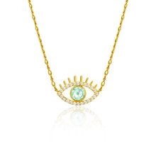 Load image into Gallery viewer, Elegant evil eye gold necklace with green-eyed charm and sparkling zirconia crystals in clear and mint green.

