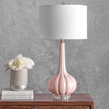 Load image into Gallery viewer, Illuminate your bedroom, living room, or any other area with this stylish pink table lamp. Its white fabric drum shade creates a perfect balance of lighting.
