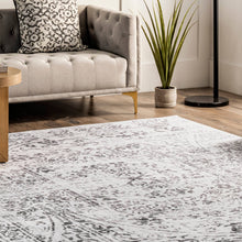 Load image into Gallery viewer, Add warmth to your living room with a washable, machine-made rug featuring transitional vintage style. Made in China.
