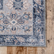 Load image into Gallery viewer, An opulent blue and white rug showcasing a detailed design. Created using 100% polyester and machine-made in China, this rug exhibits a smooth flat pile and comes with an integrated non-slip backing.

