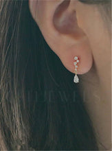 Load image into Gallery viewer, Two exquisite diamond earrings with white gold accents, designed as mini chandelier CZ drop earrings in sterling silver.
