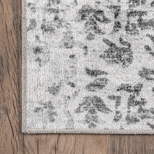 Load image into Gallery viewer, Sophisticated black and white rug with a vintage touch. 100% Polyester. Machine-made in China.
