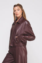 Load image into Gallery viewer, Woman wearing a brown leather outfit on a white background
