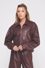 Load image into Gallery viewer, Woman wearing a brown leather jumpsuit on a white background

