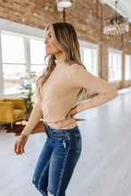 Load image into Gallery viewer, Stay trendy with this mock neck tan long sleeve top, a versatile addition to your wardrobe.
